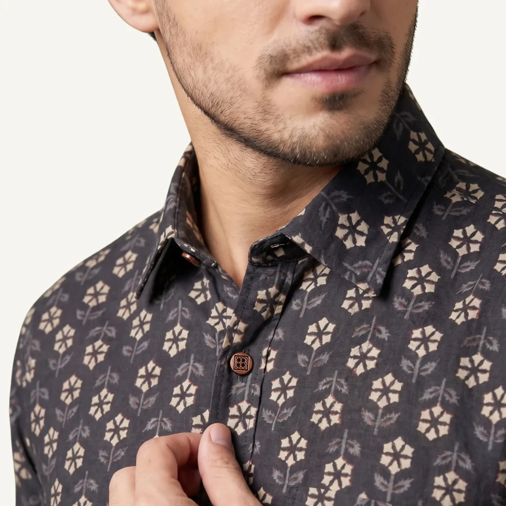 Men’s black floral printed cotton shirt with classic spread collar close-up